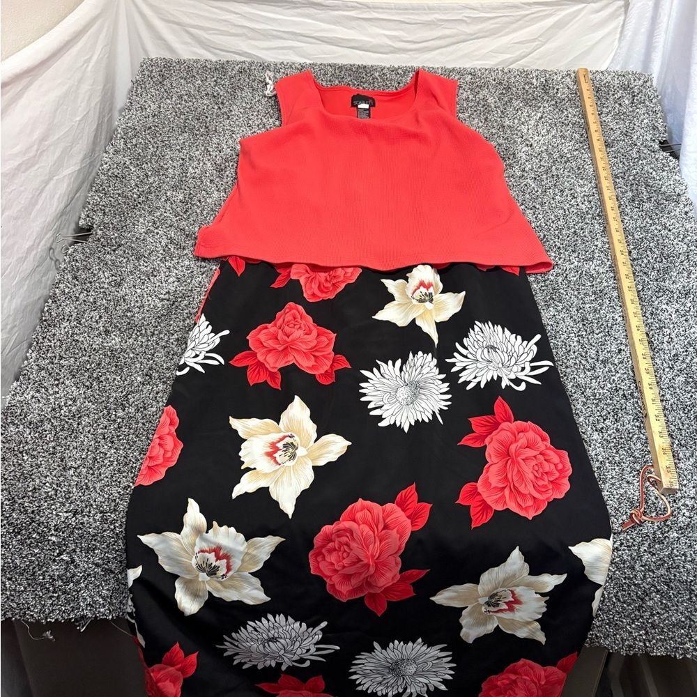 Scarlett Vibrant coral dress with floral bottom. One piece woman’s size 16